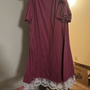 Cold shoulder tunic with lace detail on front hem